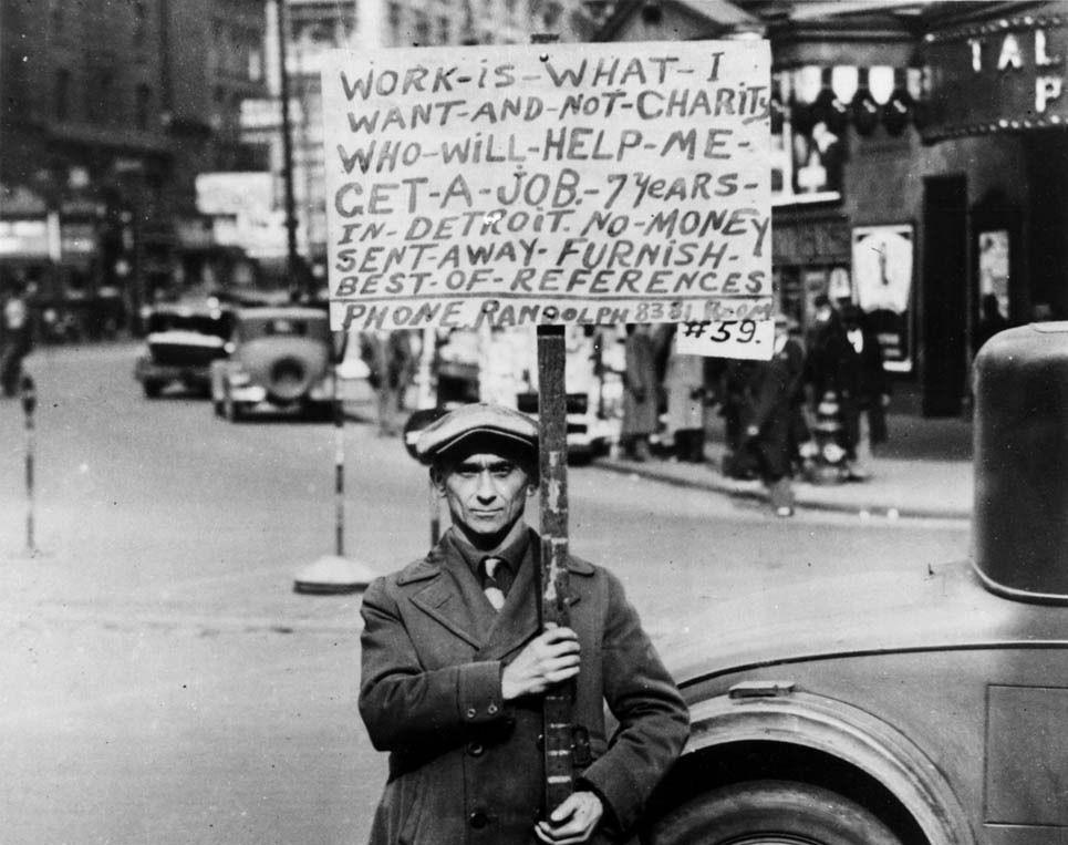 During the Depression, unemployment struck the nation’s large industrial cities with particular ferocity. In Detroit, automobile production dropped by half. Nearly one-third of all families there had no breadwinner. This unemployed worker took to the streets in search of work.