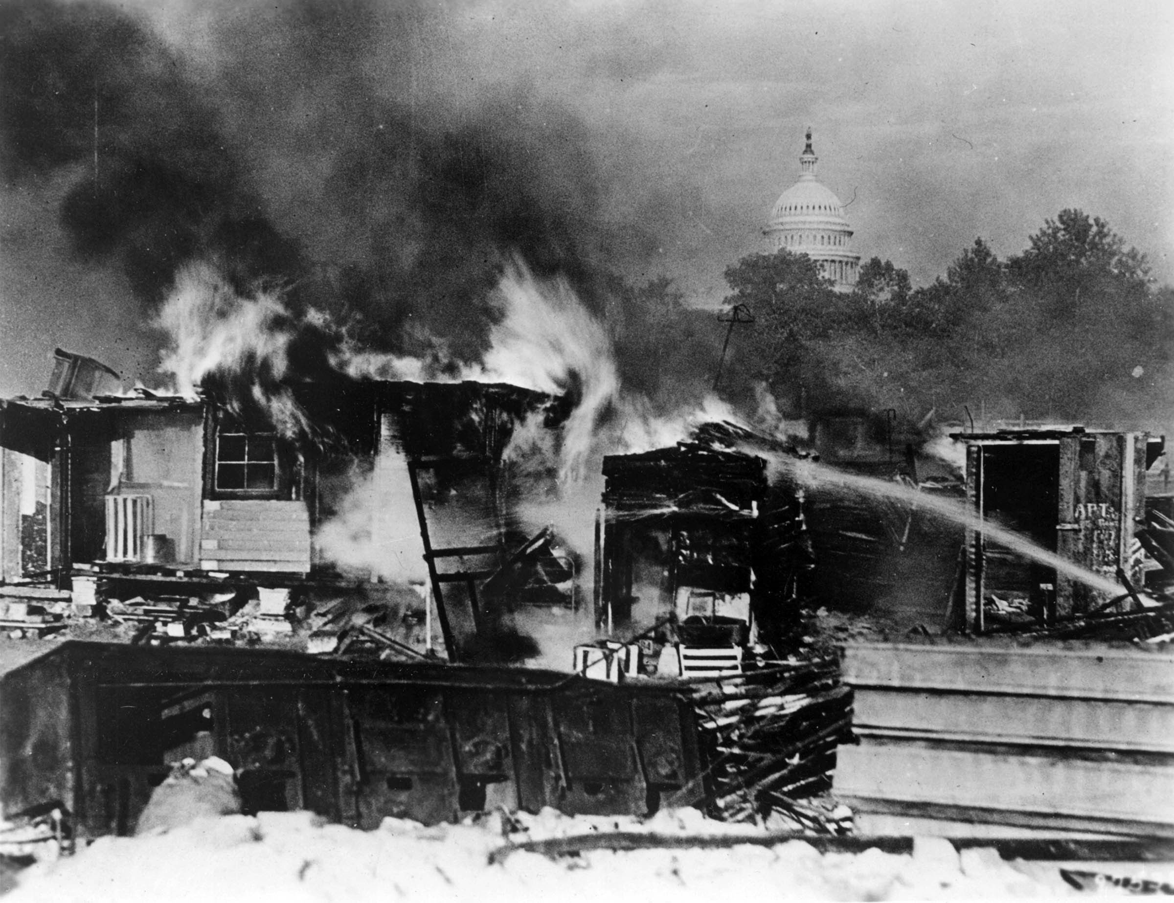 The Bonus Marchers’ shantytown burned down within sight of the Capitol on the afternoon of July 28, 1932. Federal troops had set fire to the camp after dispersing the unemployed and unhoused World War I veterans who were asking for an early release of their war bonuses.