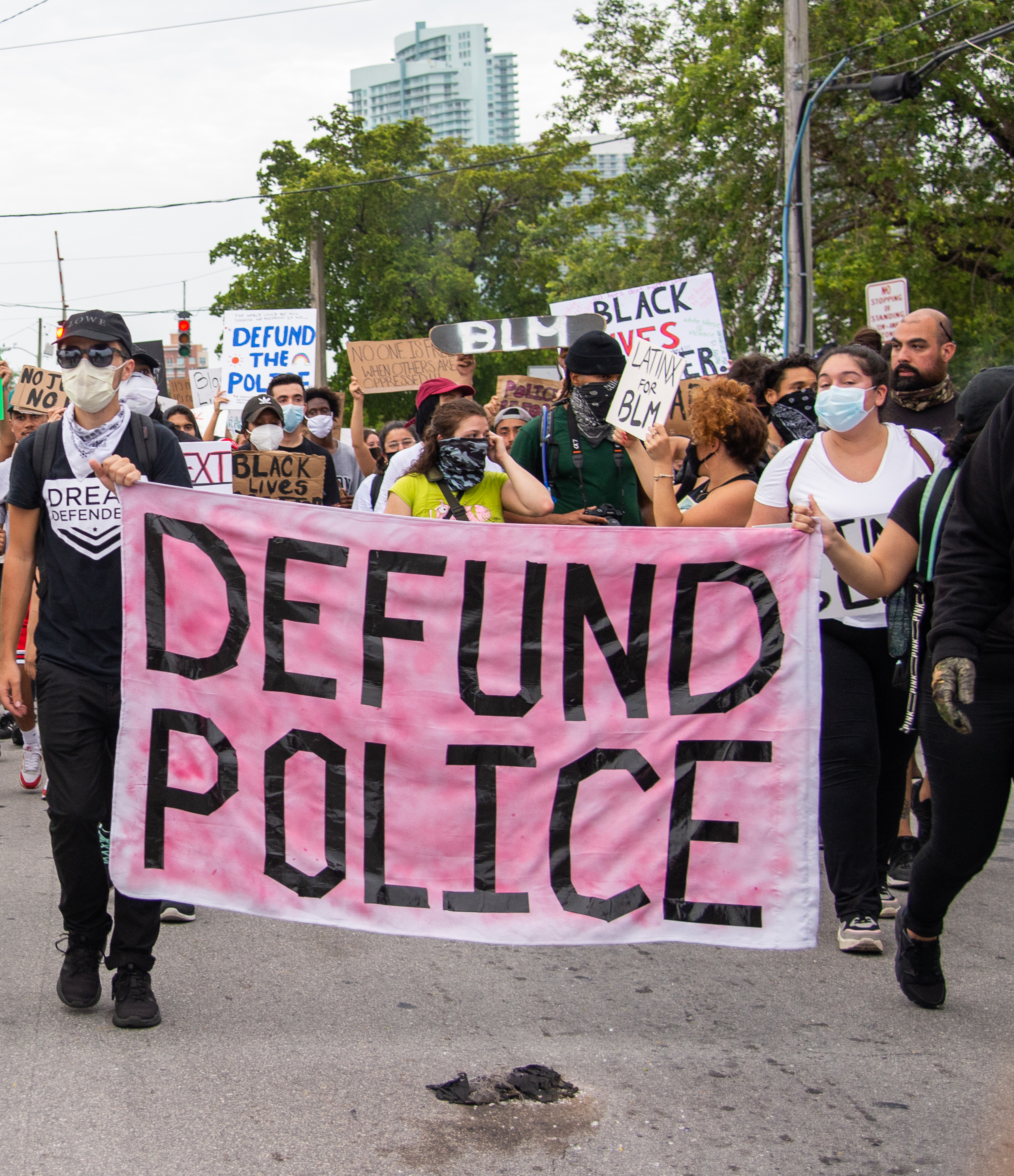 Banners at a June 2020 Black Lives Matter protest in Miami prominently display one of the demands that emerged in the aftermath of the police murder of George Floyd. While ending police brutality had been one of the calls for change dating back to the 1960s civil rights movement, “Defund the Police” proposed a major shift in the allocation of resources away from law enforcement—characterized by well-financed and increasingly militarized police departments—to underfunded community institutions and activities that addressed inequality (and, many argued, the root causes of crime). Conservatives, however, stoked public fear by simplifying the demand as calling for the abolishment of the police, while many liberals, fearing a resulting backlash at the polls, rejected the slogan outright. But a Gallup poll later that year indicated widespread support for reducing police budgets and directing funds to community organizations.