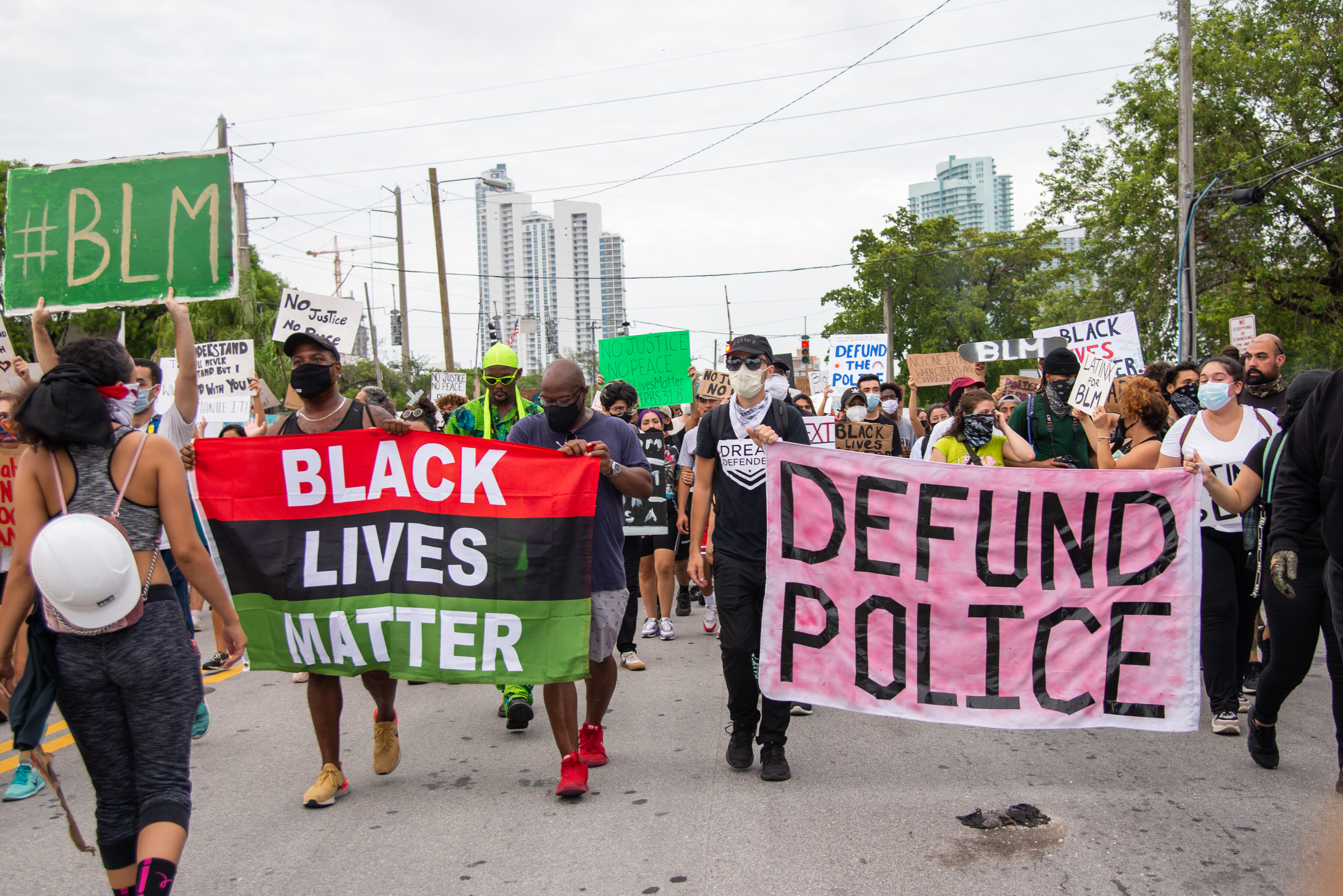 Banners at a June 2020 Black Lives Matter protest in Miami prominently display one of the demands that emerged in the aftermath of the police murder of George Floyd. While ending police brutality had been one of the calls for change dating back to the 1960s civil rights movement, “Defund the Police” proposed a major shift in the allocation of resources away from law enforcement—characterized by well-financed and increasingly militarized police departments—to underfunded community institutions and activities that addressed inequality (and, many argued, the root causes of crime). Conservatives, however, stoked public fear by simplifying the demand as calling for the abolishment of the police, while many liberals, fearing a resulting backlash at the polls, rejected the slogan outright. But a Gallup poll later that year indicated widespread support for reducing police budgets and directing funds to community organizations.