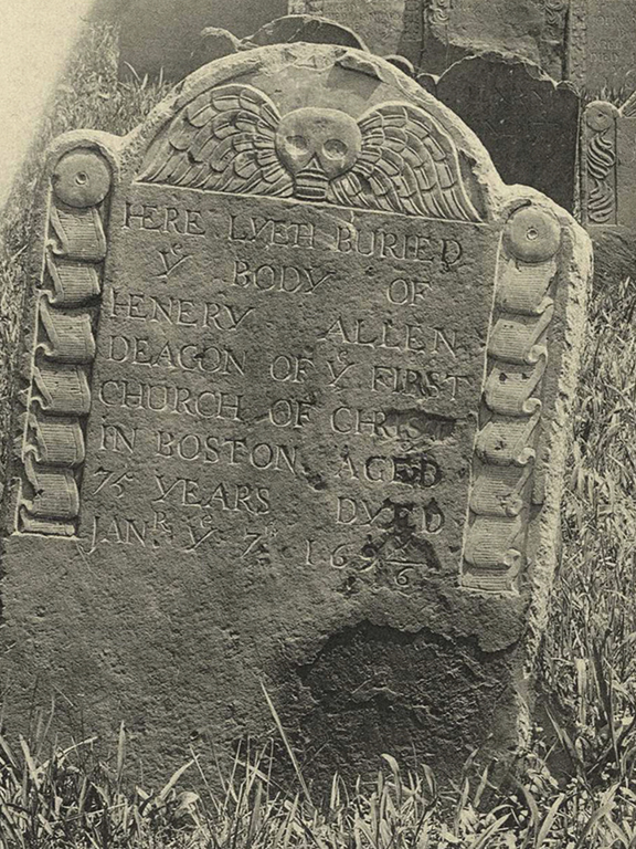 This gravestone marks the death of Henery Allen, buried in the Granary Burying Ground, Boston, Massachusetts. The stone reads: “Here lyeth buried the body of Henery Allen, Deacon of the First Church of Christ in Boston, Aged 75 years, Dyed January 7 1695/96.”