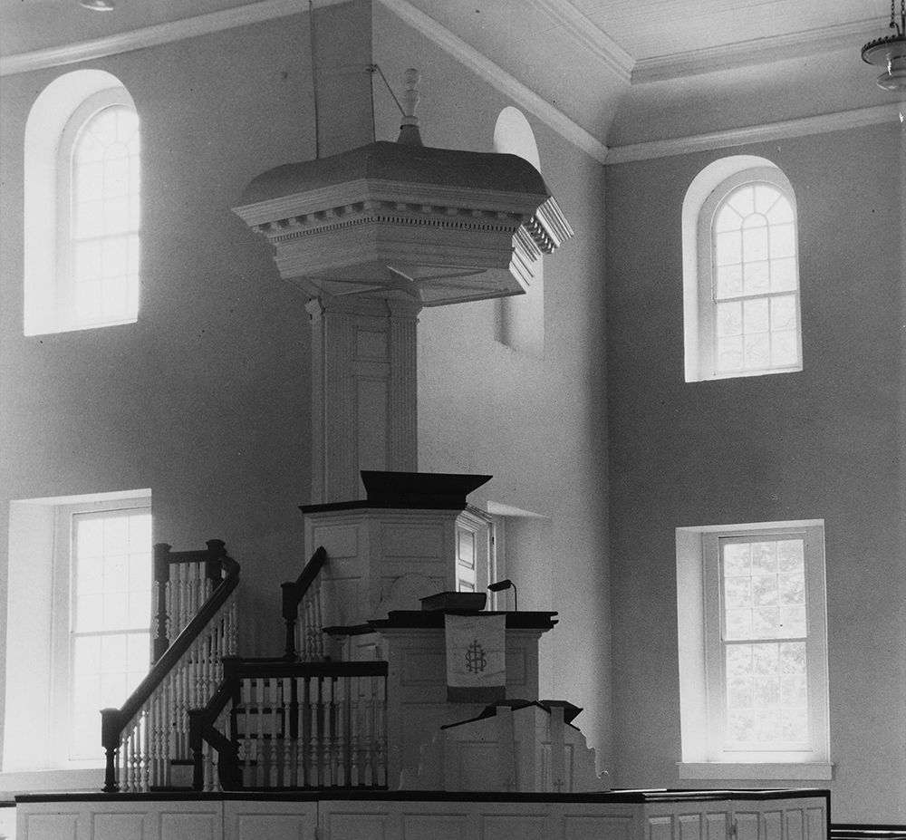 The Aquia Church in northern Virginia’s Stafford County (built in 1754–57) offered its congregants light and space while also reinforcing the colony’s social hierarchy. Its imposing three-decker pulpit, of a style that made its appearance in Virginia by the late seventeenth century, accentuated the authority of the clergy and heightened the respectability of the gentry.