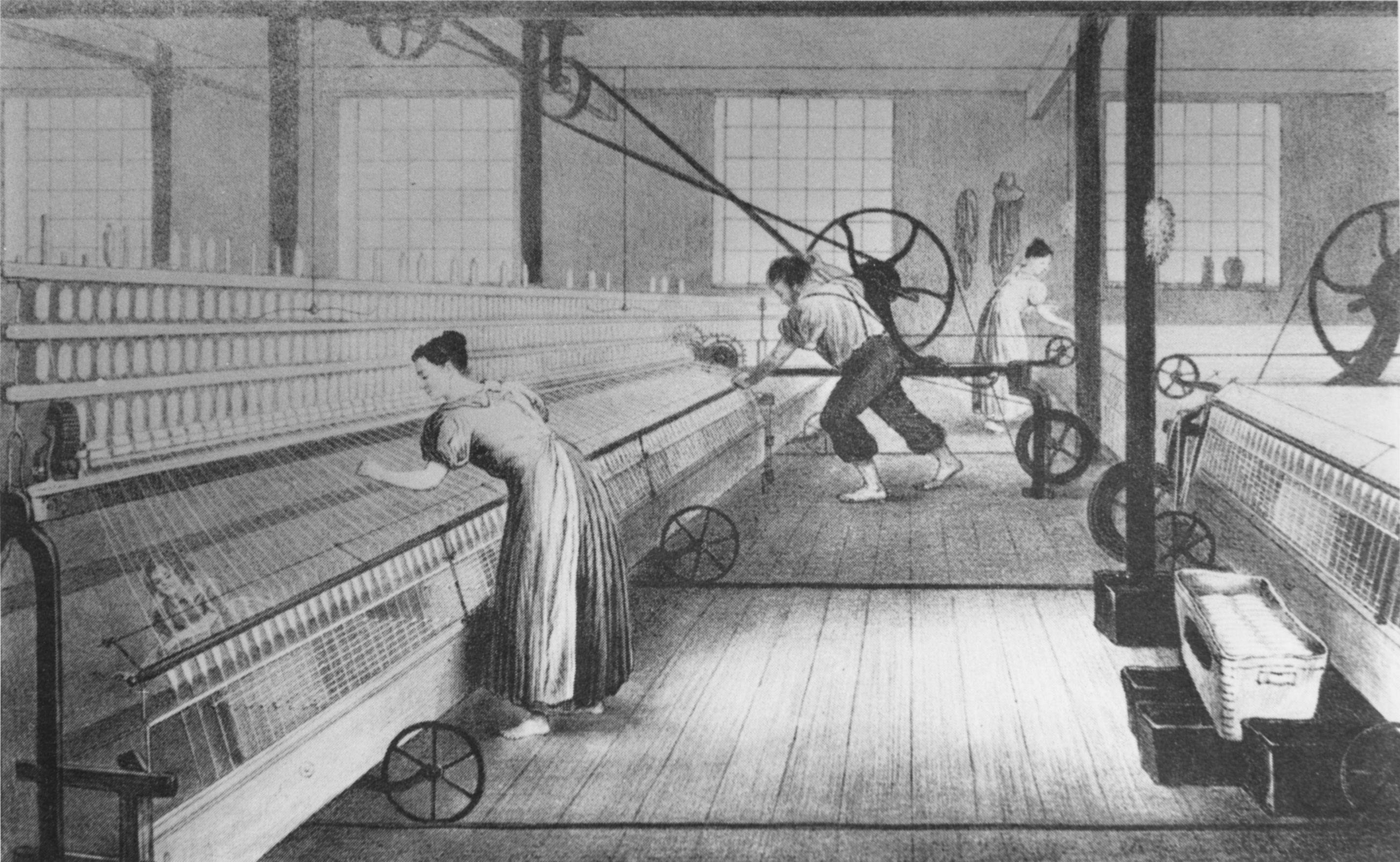 This picture depicts the spinning of yarn, part of the process of cotton production chronicled in a series of twelve prints, published from 1835 to 1840, called <em>The Progress of Cotton</em>. The woman on the left is repairing broken threads while a child crouching below the threads (a “scavenger”) cleans the machine.