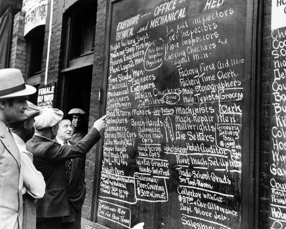 July 1941 listings of available industrial jobs cluttered a Detroit labor-exchange blackboard, showing the dramatic effect that the war in Europe had on the U.S. economy.