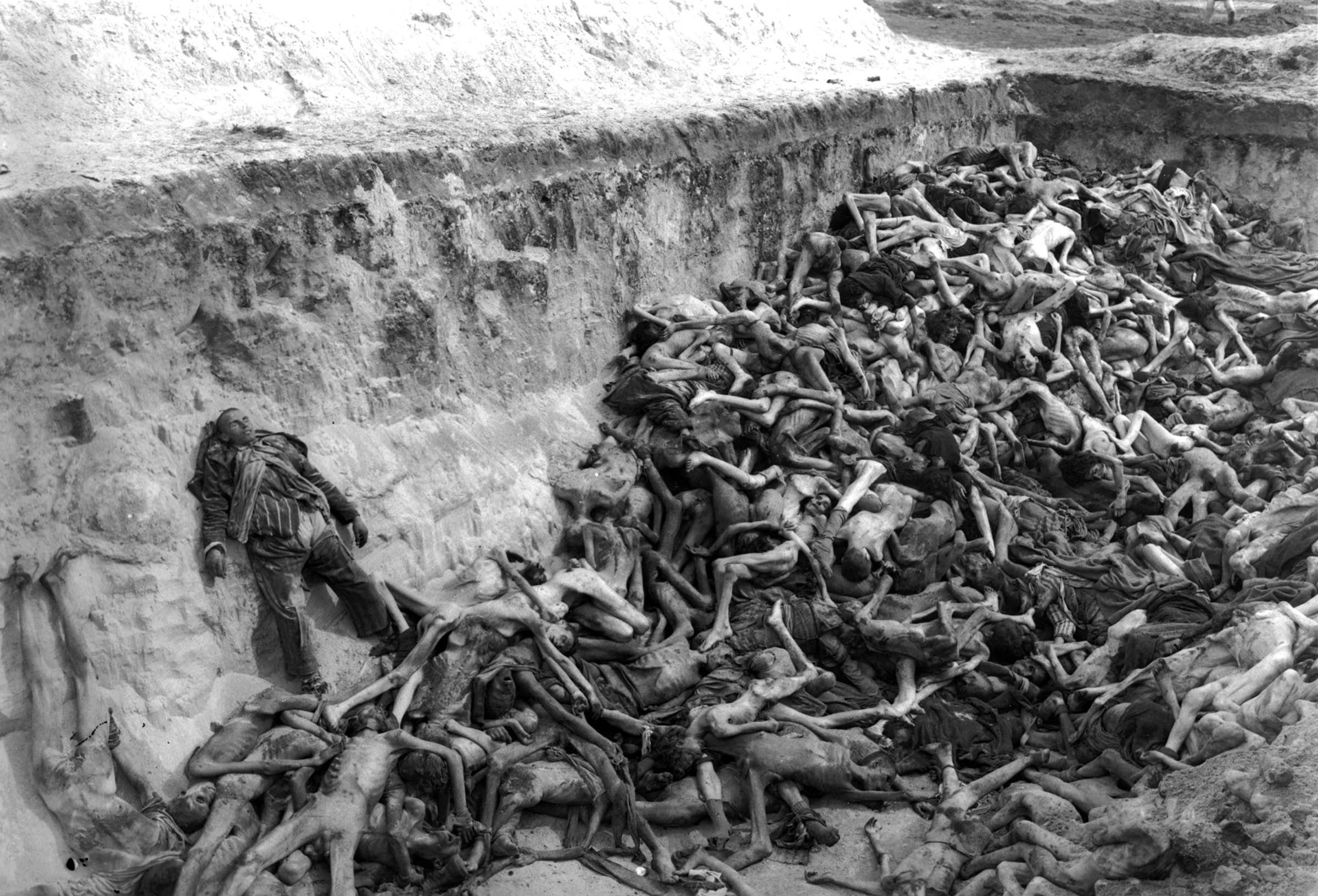 When British soldiers liberated the concentration camp in Bergen-Belsen, Germany, in April 1945, they found thousands of unburied dead. Of the 60,000 camp survivors, almost half would die in the next few weeks, most succumbing to typhus. In an attempt to quell the epidemic, the British liberators buried the dead in mass graves and eventually burned the camp to the ground. The systematic extermination of almost six million European Jews during World War II was part of an overall death toll that claimed at least fifty-five million lives.