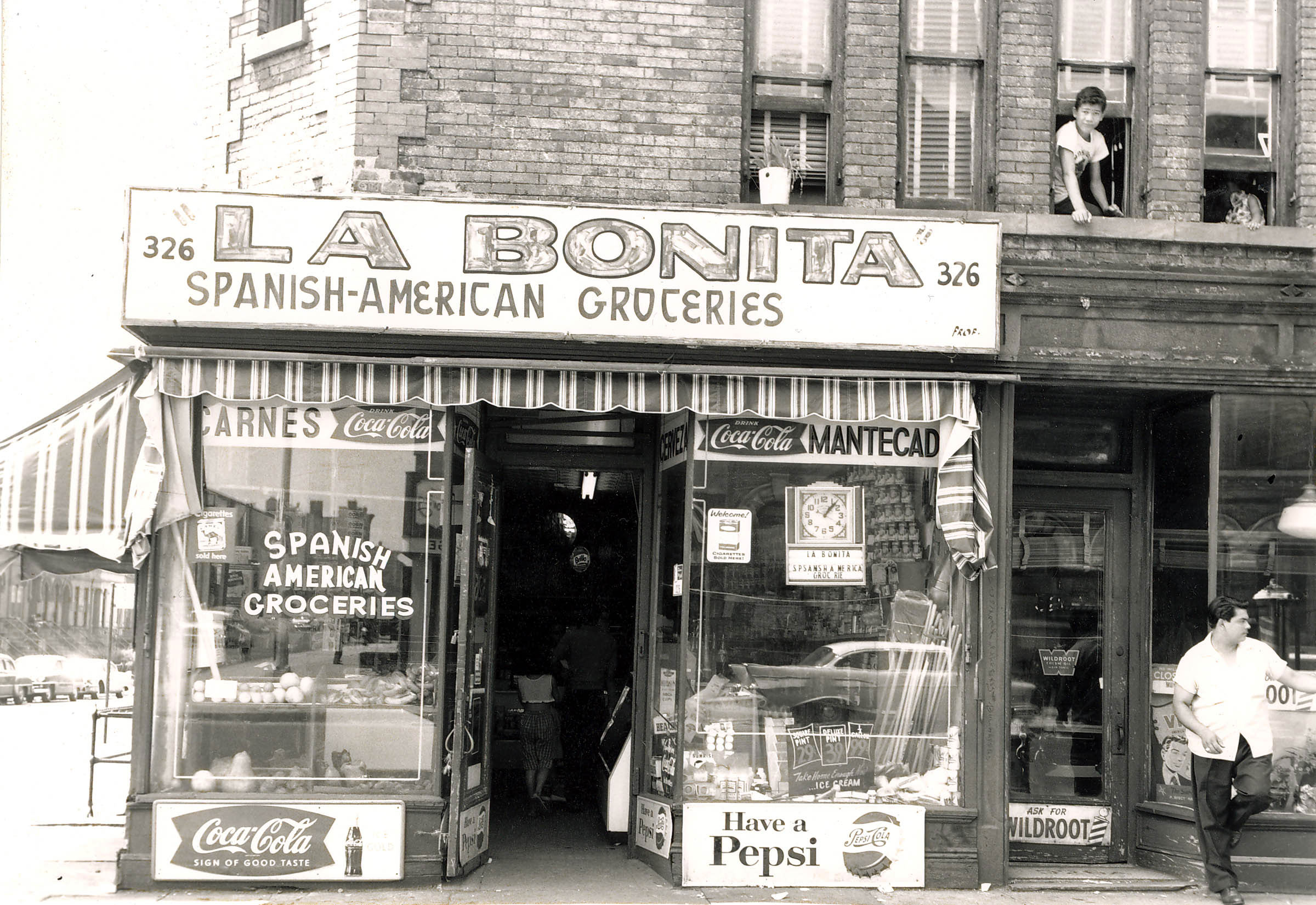 More than 40,000 <em>puertorriqueños</em> arrived in the United States each year between 1946 and 1956. Most settled in New York City, where <em>bodegas</em>, or family-owned grocery stores, were the first Puerto Rican–owned businesses and mainstay of the immigrant community—the place to get Caribbean and Spanish American delicacies, locate information about official and informal services, and catch up on news about the community as well as friends and relatives back home.