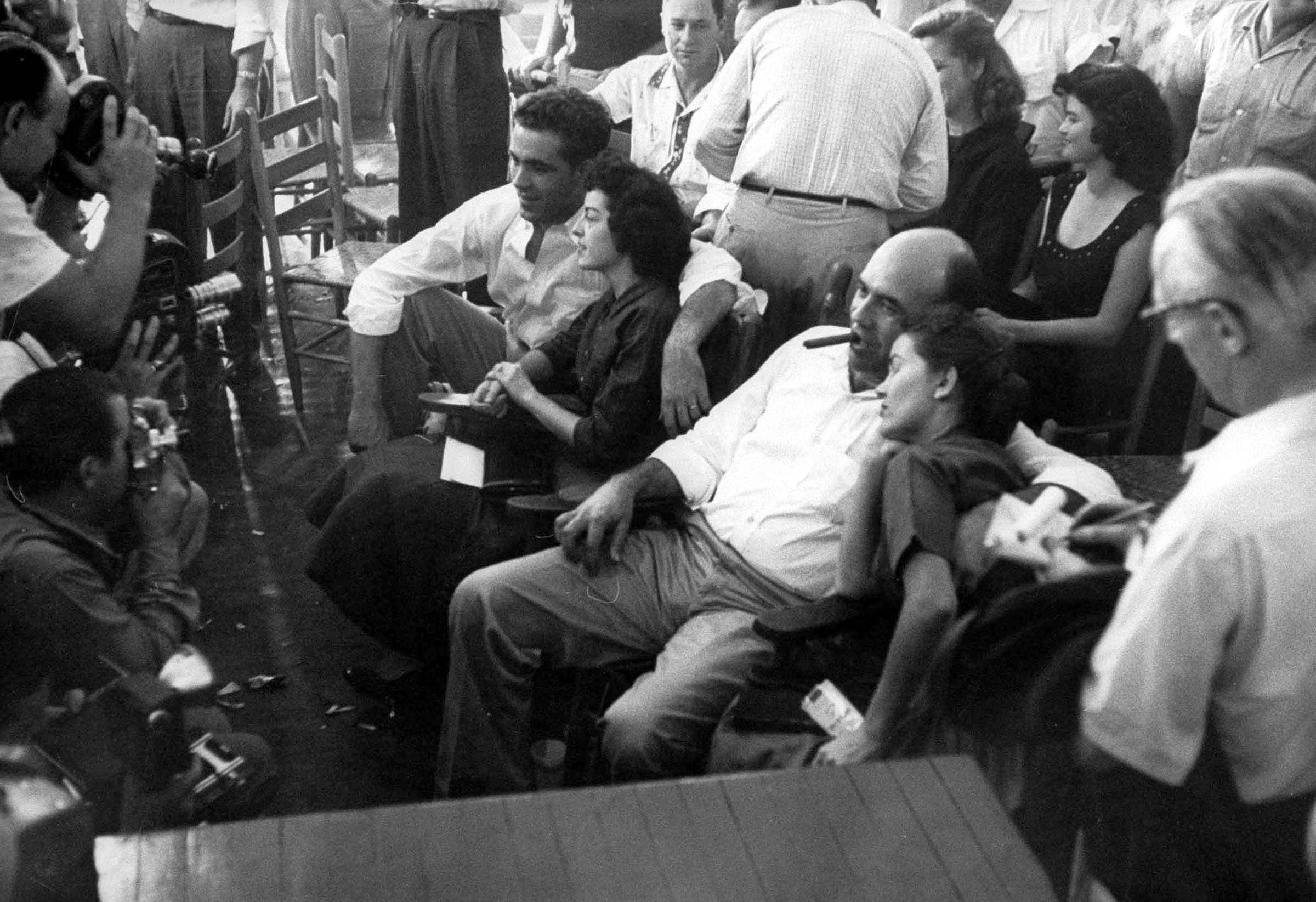 The terror that African Americans faced in the South was starkly revealed in the August 1955 mutilation and murder of fourteen-year-old Emmett Till in rural Tallahatchie County, Mississippi. The murderers, Roy Bryant (center left) and J. W. Milam (center right), are shown here posing with their wives for news photographers after they were brought to trial and acquitted by an all-white jury.