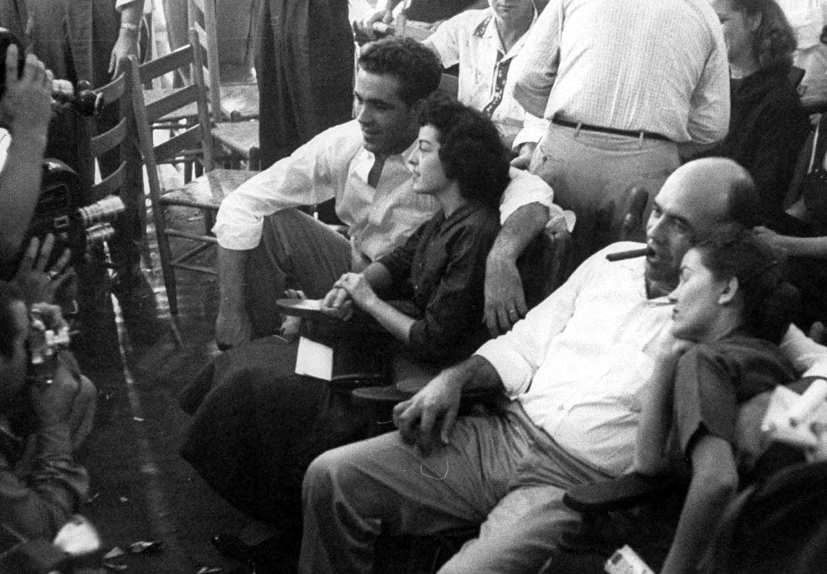 The terror that African Americans faced in the South was starkly revealed in the August 1955 mutilation and murder of fourteen-year-old Emmett Till in rural Tallahatchie County, Mississippi. The murderers, Roy Bryant (center left) and J. W. Milam (center right), are shown here posing with their wives for news photographers after they were brought to trial and acquitted by an all-white jury.