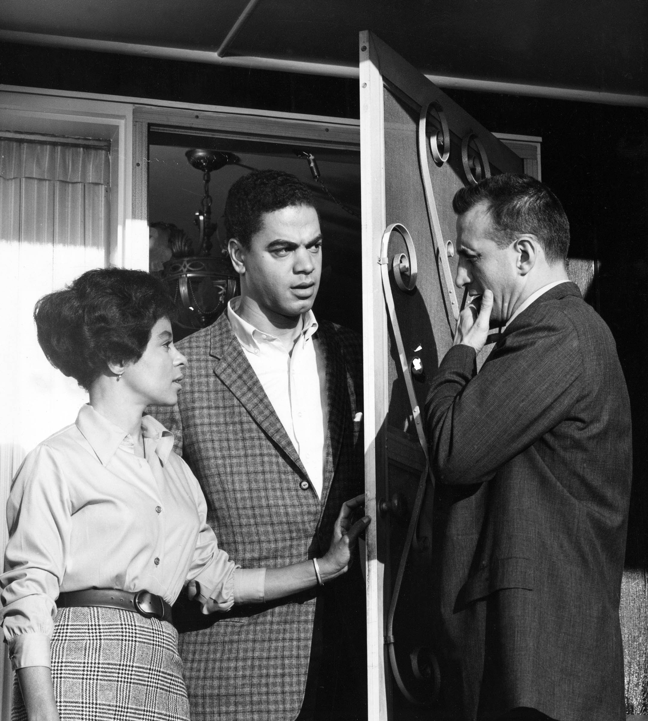 By the early 1960s, television news programs regularly reported on poverty in the nation’s cities. But most prime-time dramatic programs ignored life in the inner city. One exception was the 1963 CBS series <em>Eastside/Westside</em>, featuring George C. Scott (right) and Cicely Tyson as idealistic New York City social workers. Although the series’ characters won small victories against discrimination and inequality—as in the episode pictured here, with Ruby Dee and Earle Hyman portraying a Black couple living in a previously all-white neighborhood—<em>Eastside/Westside</em>’s view of urban poverty as an insurmountable problem was unusually pessimistic. The program lasted only one season.