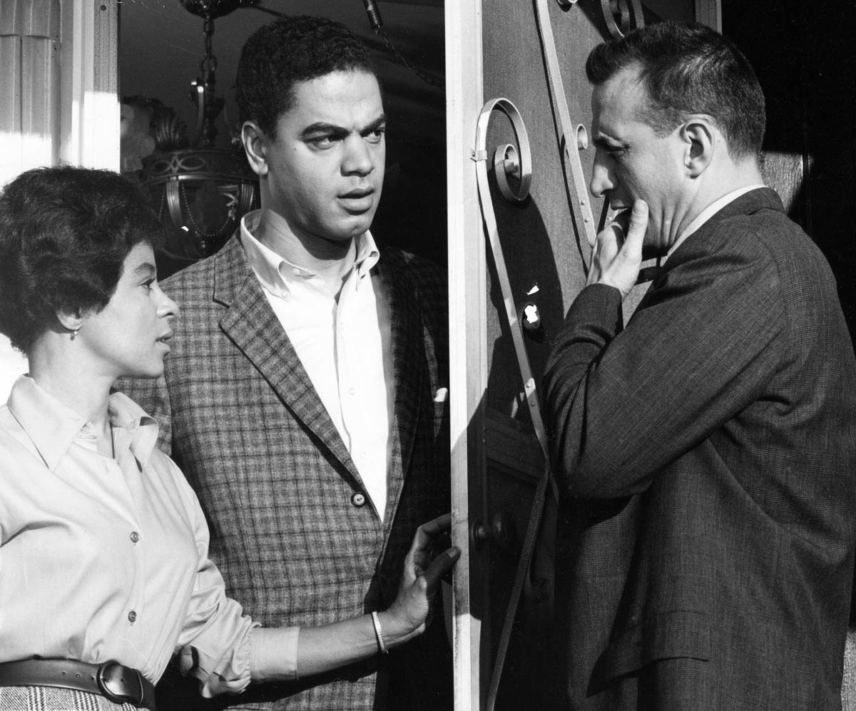 By the early 1960s, television news programs regularly reported on poverty in the nation’s cities. But most prime-time dramatic programs ignored life in the inner city. One exception was the 1963 CBS series <em>Eastside/Westside</em>, featuring George C. Scott (right) and Cicely Tyson as idealistic New York City social workers. Although the series’ characters won small victories against discrimination and inequality—as in the episode pictured here, with Ruby Dee and Earle Hyman portraying a Black couple living in a previously all-white neighborhood—<em>Eastside/Westside</em>’s view of urban poverty as an insurmountable problem was unusually pessimistic. The program lasted only one season.