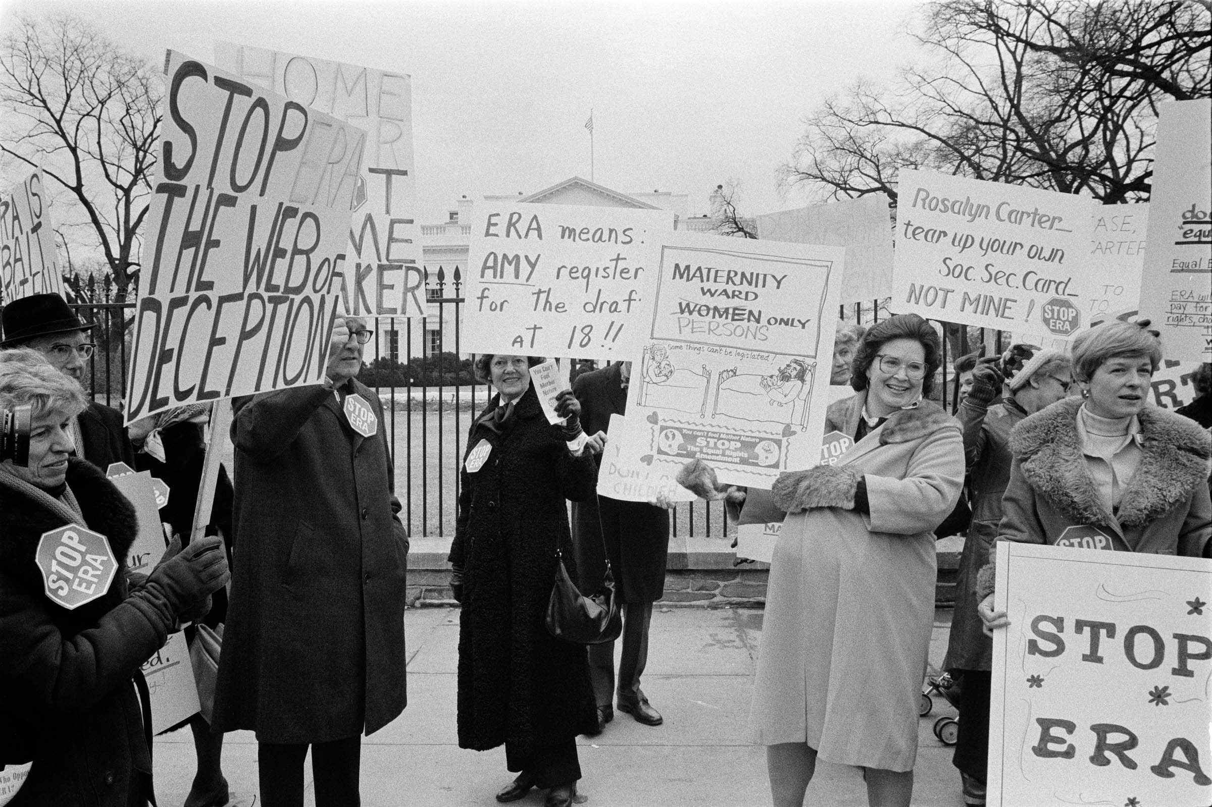 Carrying signs that warned of ways in which the Equal Rights Amendment would purportedly victimize women and that referred to President Carter’s daughter Amy and his wife Rosalynn (both ERA supporters), opponents of the amendment demonstrate in front of the White House in February 1977.