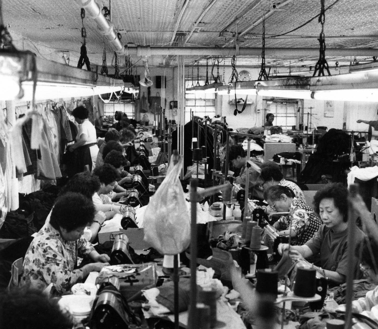 Asian workers laboring in a garment shop in lower Manhattan in 1991. The setting was reminiscent of sweatshop working conditions in the clothing industry earlier in the twentieth century.