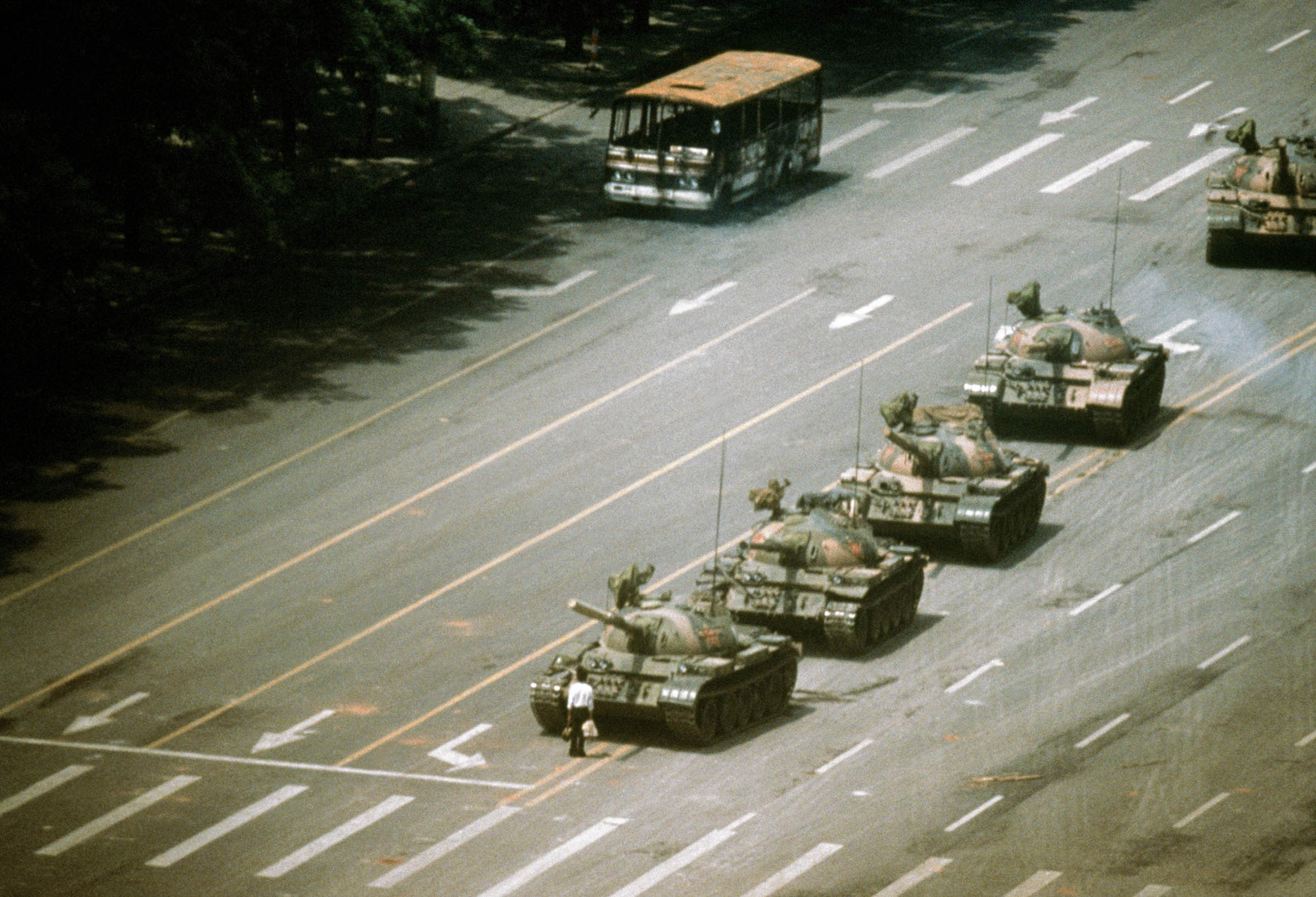 In the immediate aftermath of the June 1989 Tiananmen Square massacre, when Chinese troops killed hundreds of students as they crushed a democratic protest in Beijing, one image that symbolized the spirit of the demonstrators was published and broadcast around the world. A lone Chinese citizen blocked a convoy of tanks on Beijing’s Avenue of Eternal Peace. After a tense standoff, in contrast to the government’s earlier bloody suppression, the tanks did not harm the protester but instead drove around him.