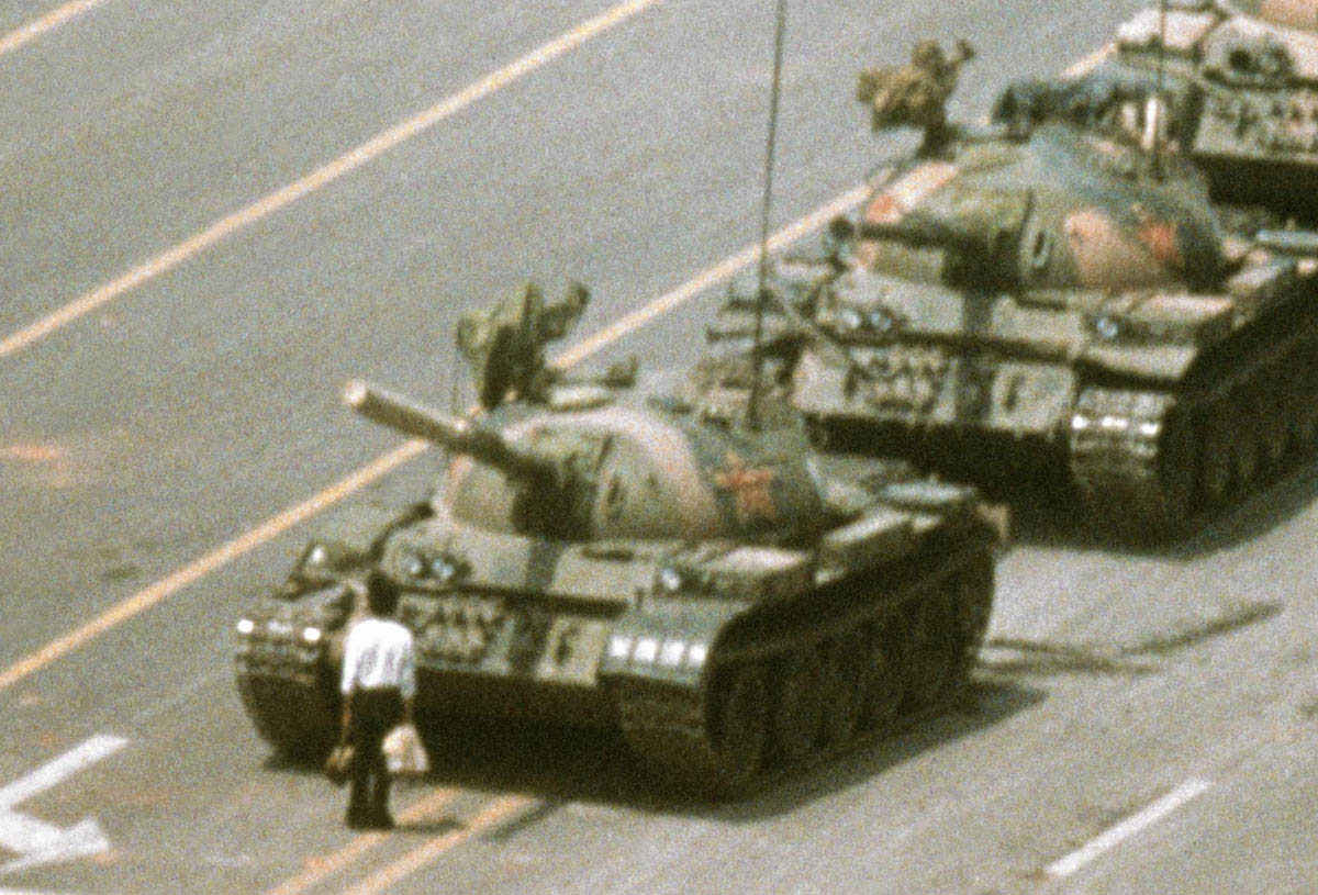 In the immediate aftermath of the June 1989 Tiananmen Square massacre, when Chinese troops killed hundreds of students as they crushed a democratic protest in Beijing, one image that symbolized the spirit of the demonstrators was published and broadcast around the world. A lone Chinese citizen blocked a convoy of tanks on Beijing’s Avenue of Eternal Peace. After a tense standoff, in contrast to the government’s earlier bloody suppression, the tanks did not harm the protester but instead drove around him.