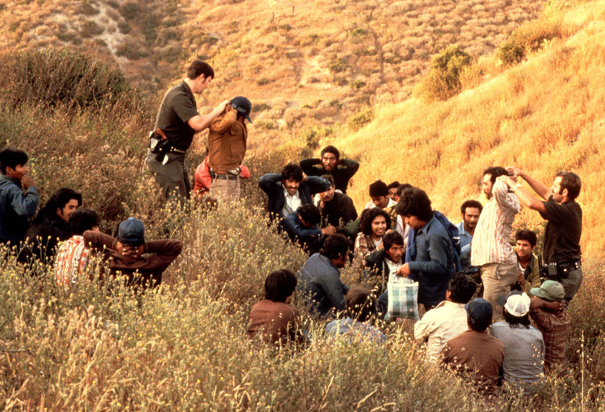 U.S. Border Patrol agents arrest a group of people who illegally entered the United States near San Diego, California. In the 1990s&nbsp;more than one million undocumented migrants crossed the border between Mexico and the United States annually.