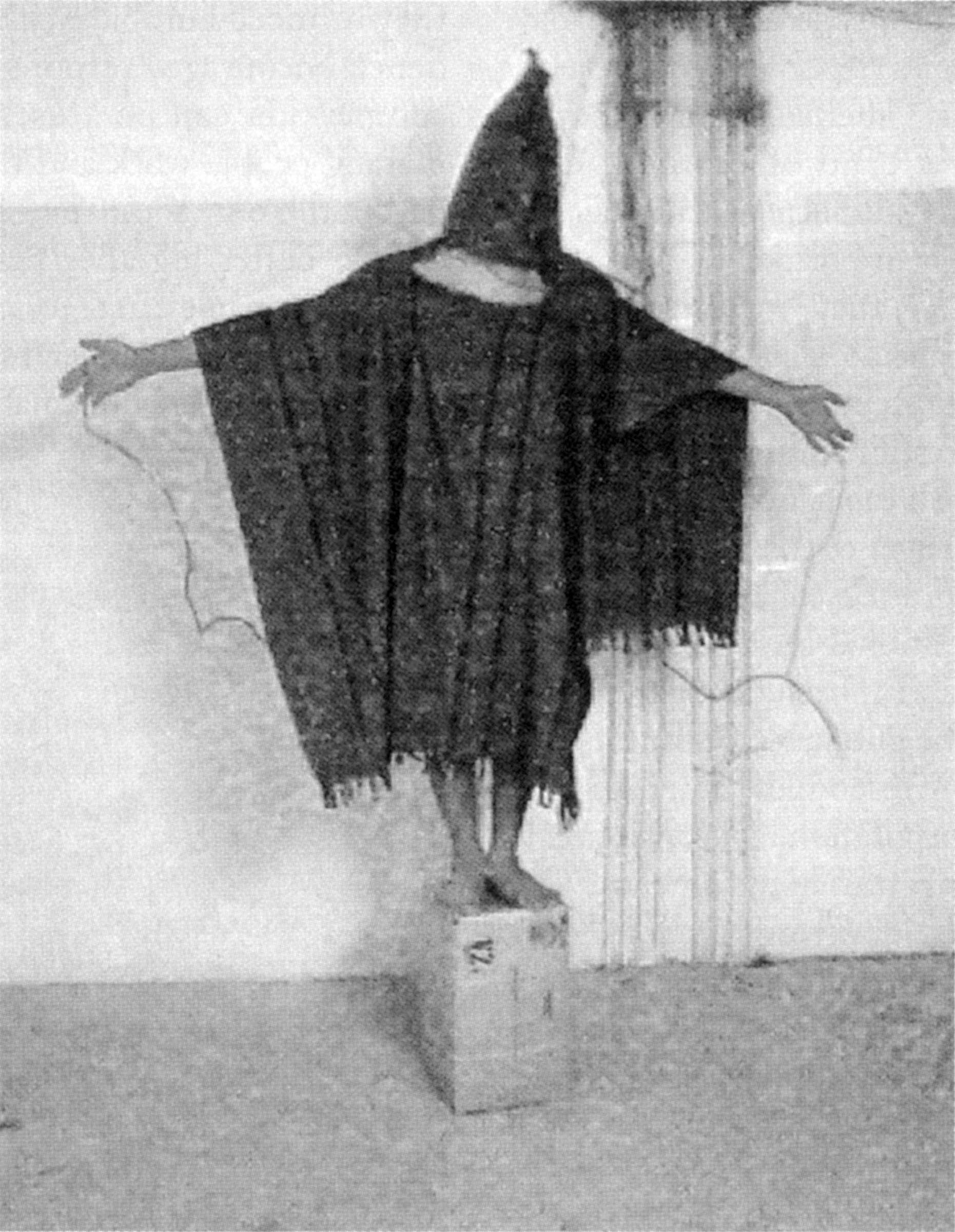 One of the most widely distributed of the photographs of abuse in Abu Ghraib prison showed an Iraqi hooded and forcibly maintaining a “stress position,” an interrogation technique that had been approved by the Pentagon. An interrogator told the prisoner that he would be electrocuted if he relaxed. Like many of the tortured prisoners, he was not a terrorist; jailed for a carjacking, he had no valuable information to divulge. Iraqis later dubbed the photograph “Statue of Liberty.”