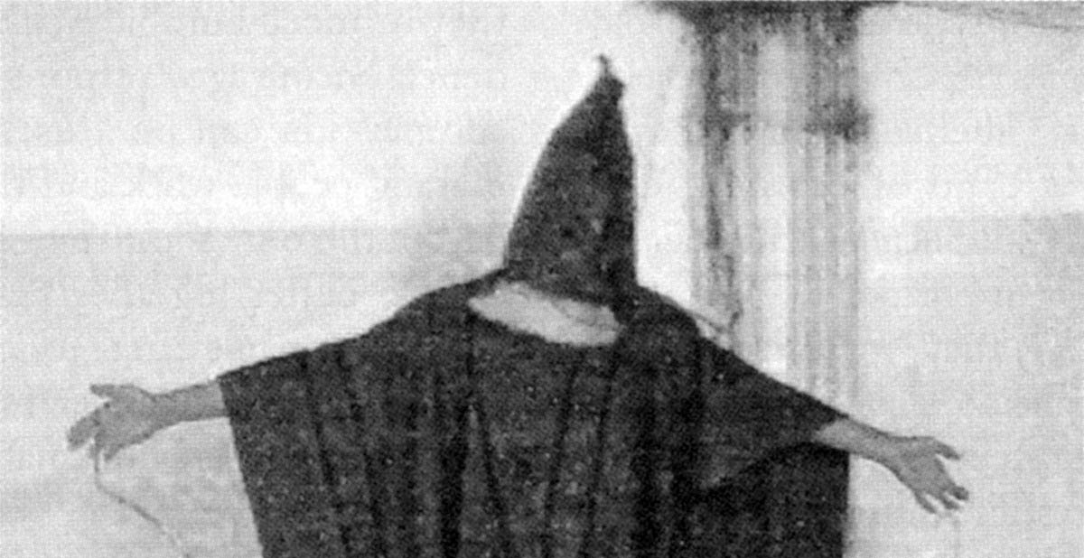 One of the most widely distributed of the photographs of abuse in Abu Ghraib prison showed an Iraqi hooded and forcibly maintaining a “stress position,” an interrogation technique that had been approved by the Pentagon. An interrogator told the prisoner that he would be electrocuted if he relaxed. Like many of the tortured prisoners, he was not a terrorist; jailed for a carjacking, he had no valuable information to divulge. Iraqis later dubbed the photograph “Statue of Liberty.”