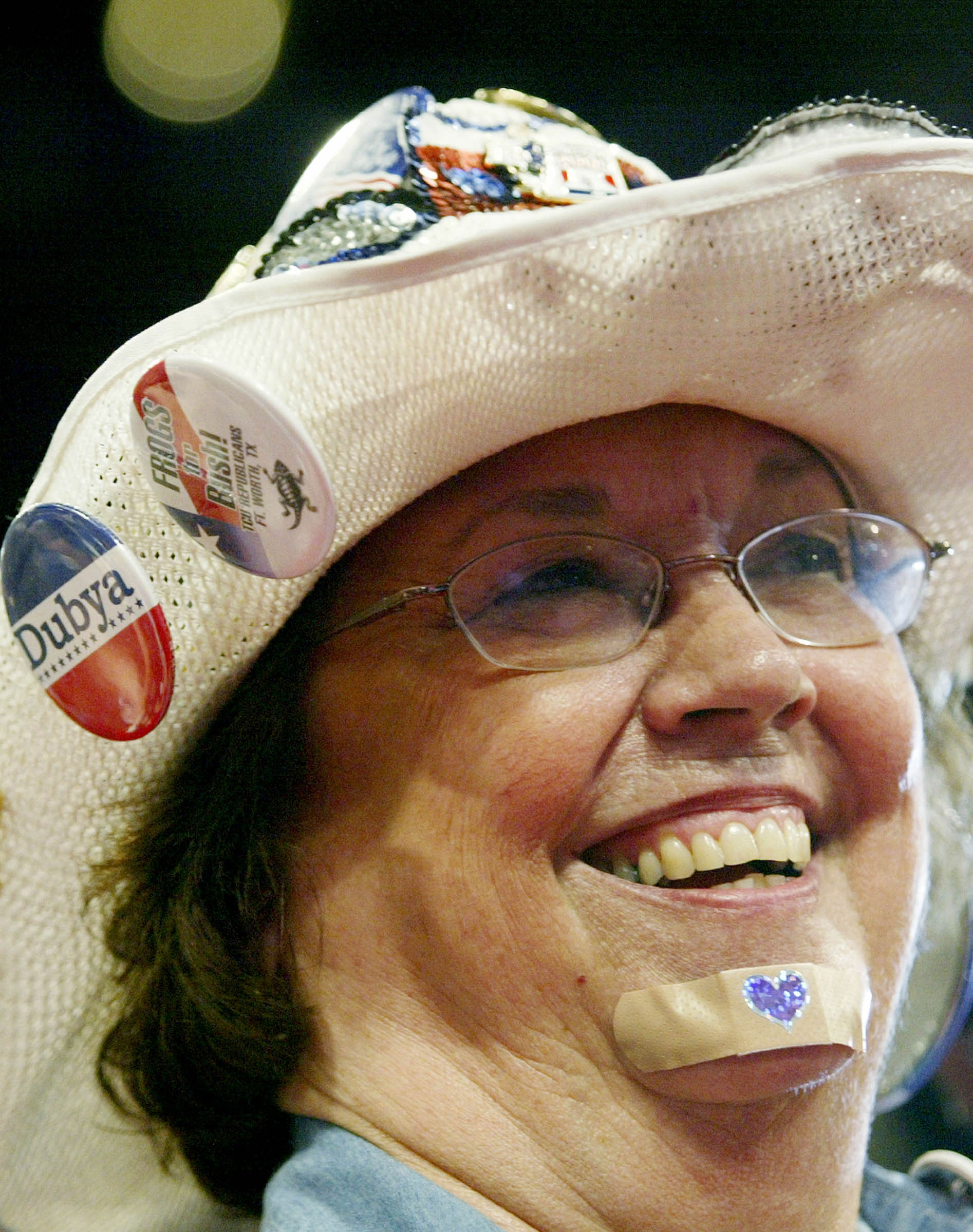 A Texas delegate at the Republican National Convention displayed an adhesive bandage with a purple heart, mocking the combat decorations received by Democratic presidential candidate John Kerry during the Vietnam War. While not officially endorsed by the Republican Party, a strategy of misrepresentation and distortion about Kerry’s military service pervaded the 2004 election campaign.