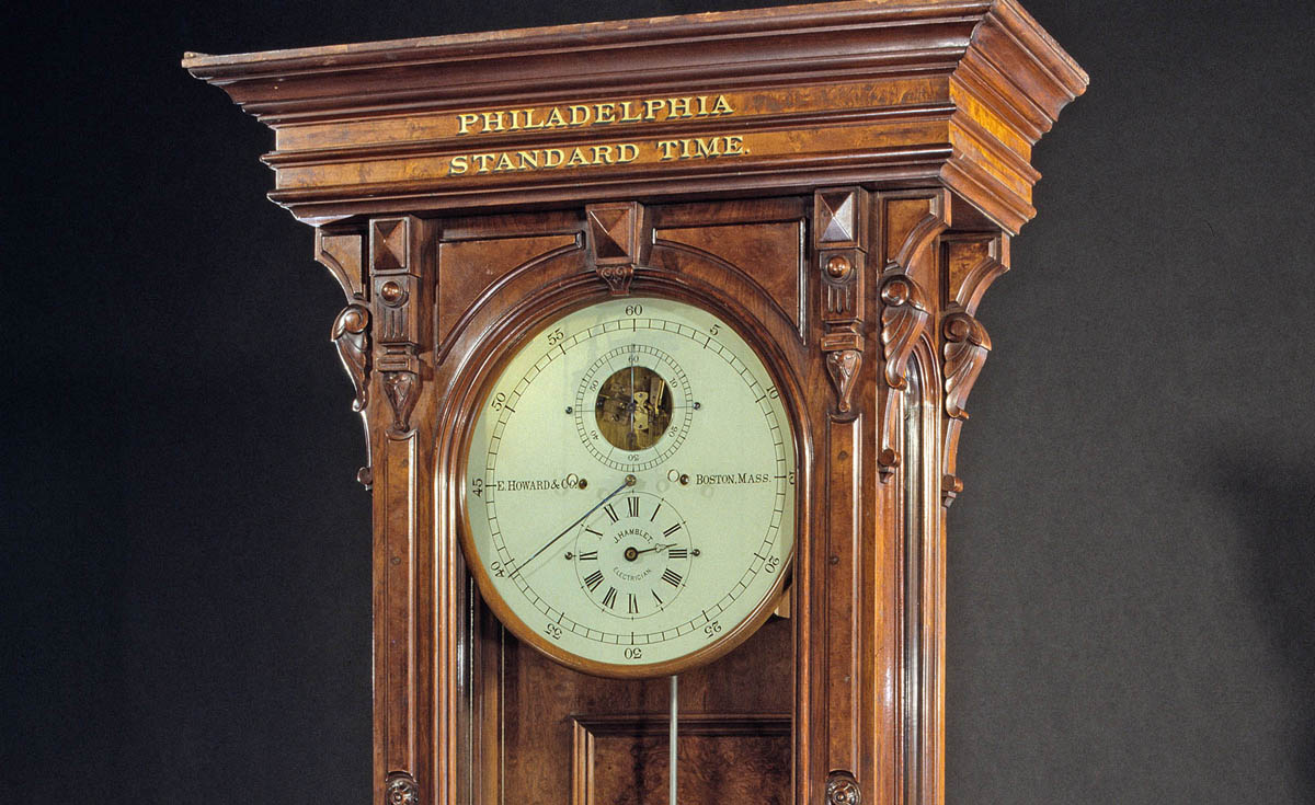 This E. Howard Wall Regulator clock hung in the offices of the Baltimore Ohio Railroad. Railroads spurred standardization in several facets of industrial life: rail equipment, business organization, and train schedules. Until 1883, Americans followed solar time, each locality setting clocks at noon on the basis of when the sun reached its highest point. However, each railroad maintained a single time across its entire line, leading to discrepancies in the schedules of competing lines as well as in localities across the continent. In 1883, a group of railroad superintendents instituted the new system of standard time with four time zones across the continental United States.