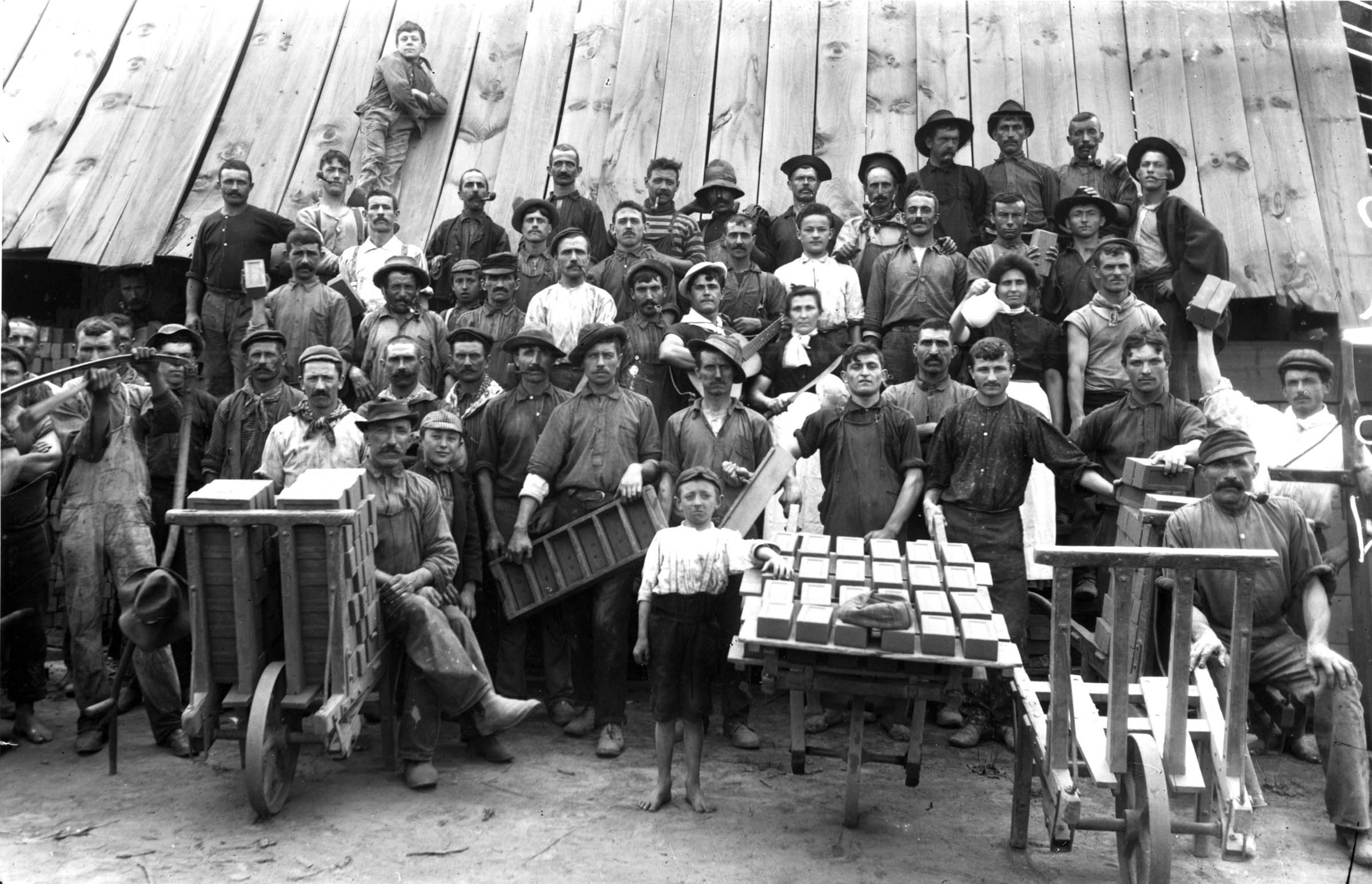 The workforce of a Massachusetts brick factory proudly posed for a photographer sometime in the late nineteenth century.