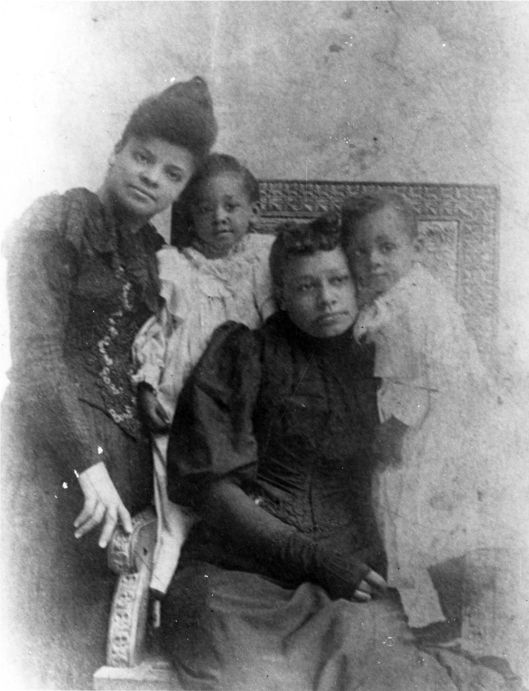 In 1892, Memphis, Tennessee, newspaper editor Ida B. Wells-Barnett revealed the role of local white businessmen in the lynching of three African American competitors. She is shown here standing with Betsy Moss and her two children, the widow and orphans of Memphis grocer Tom Moss, one of the murdered Black businessmen. A white mob destroyed Wells’s office, and she was forced to flee North, where her public lectures and writing brought lynchings to national attention.