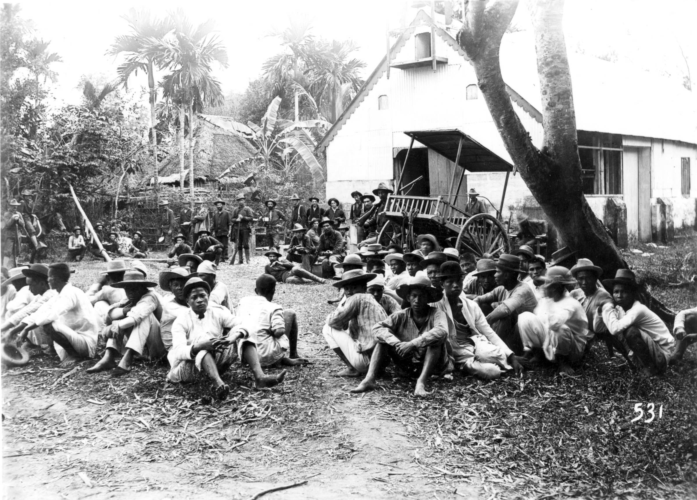 U.S. troops guard Filipino nationalist prisoners captured in Pasay and Paranque during the Filipino-American War.