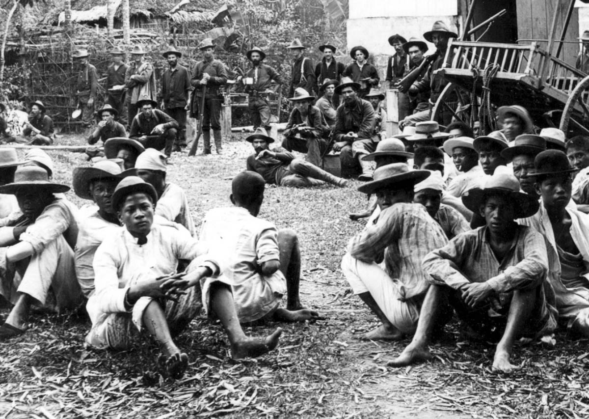 U.S. troops guard Filipino nationalist prisoners captured in Pasay and Paranque during the Filipino-American War.