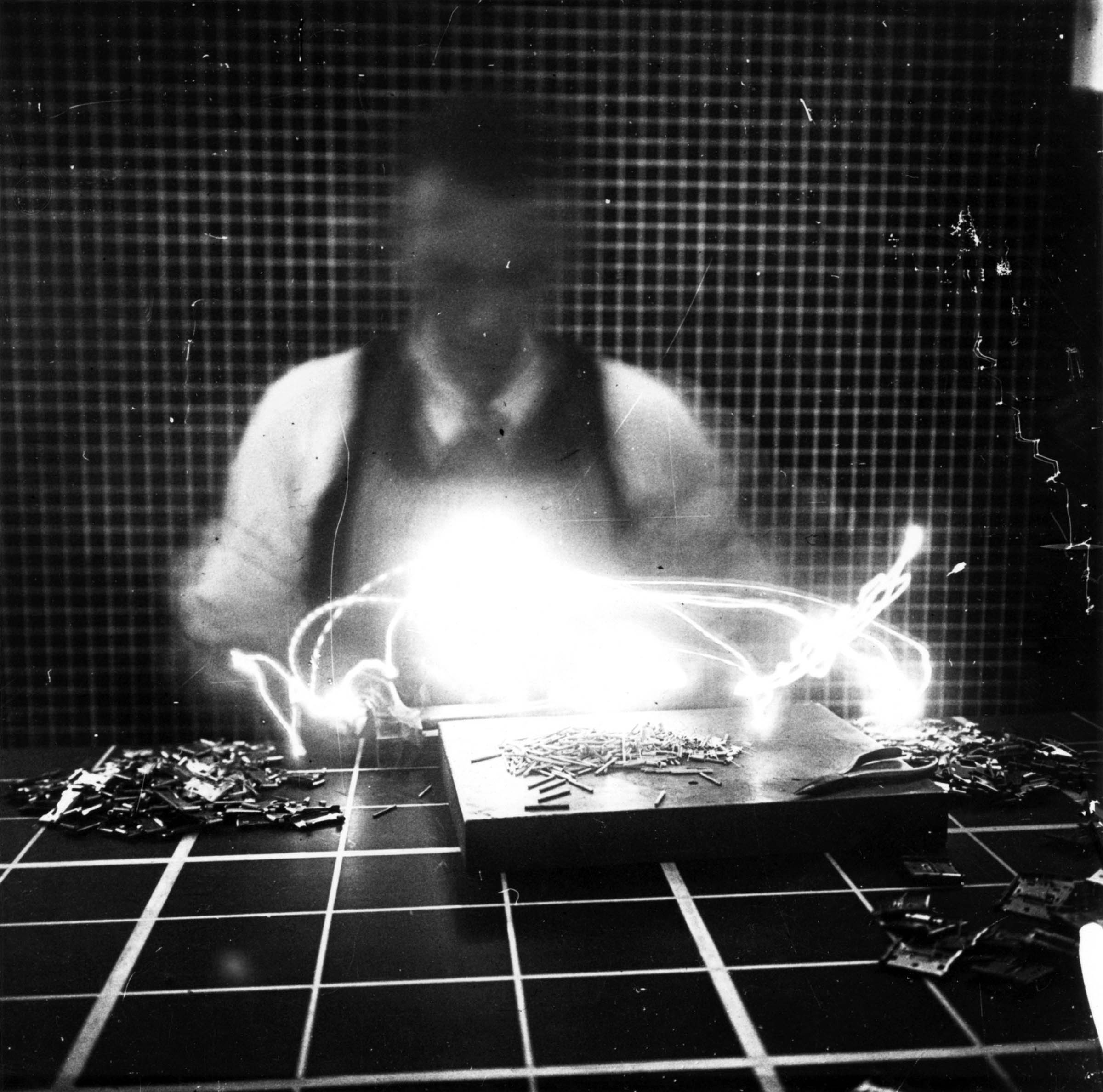 The small lights attached to this worker’s arms and hands enabled efficiency experts to track his movements. The resulting “cyclegraph,” a photograph taken by an open-shutter still camera and invented by time-and-motion specialist Frank Gilbreth, was then studied in an attempt to eliminate useless movement and turn mass-production work into a rigid arrangement of “efficient” motions.