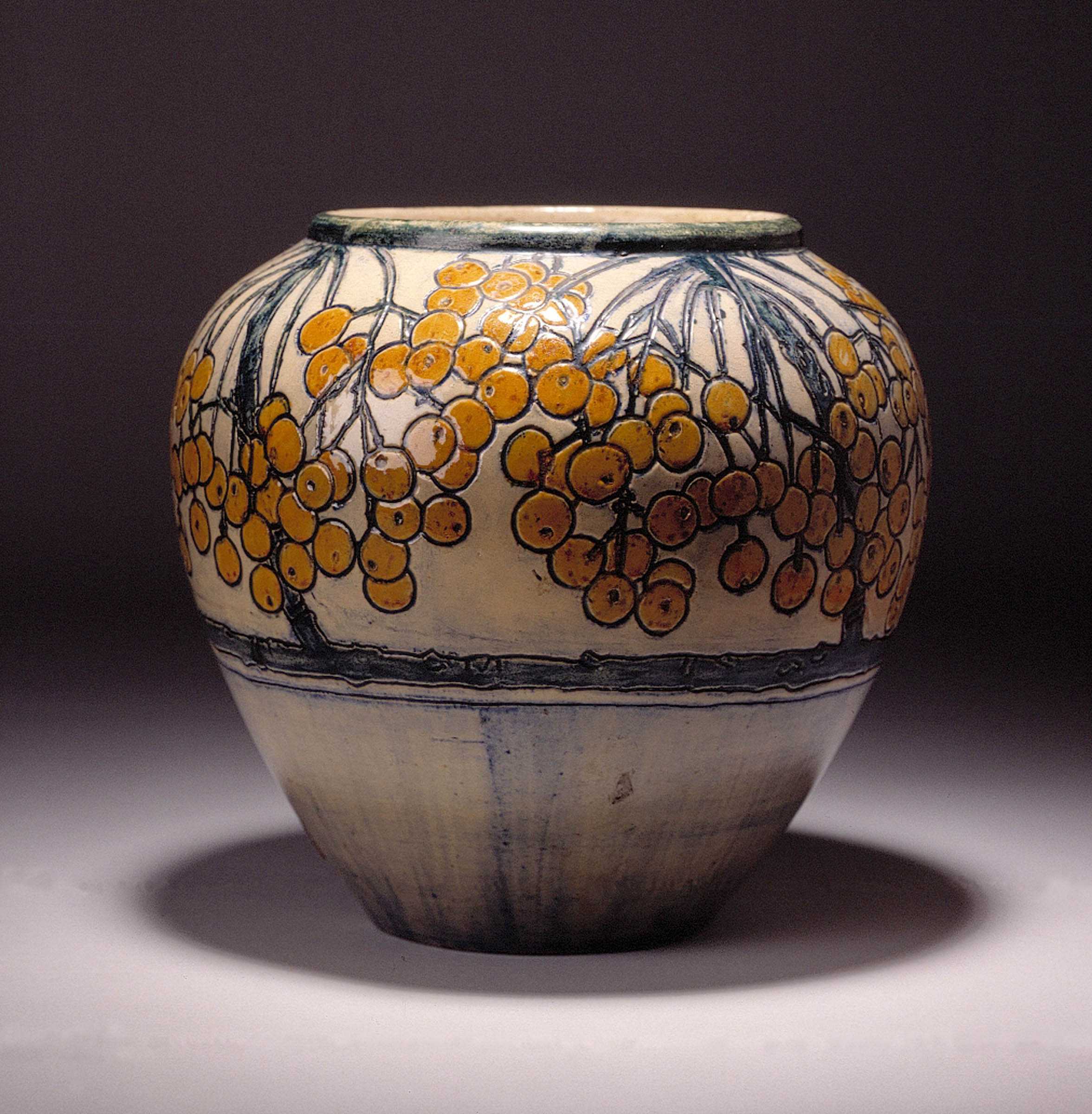 A popular interest in art pottery emerged at the turn of the century, growing out of middle-class women’s interest in employment outside the home and a design reform impulse known as the Arts and Crafts movement. The latter, founded by the English poet, artist, socialist, and reformer William Morris, believed that hand-made objects were the answer to the proliferation of low-quality mass-produced goods. The Newcomb Pottery was established in 1894 by Newcomb College (Tulane University’s women’s college) as part of the school’s ambitious program of vocational training for young women artists.