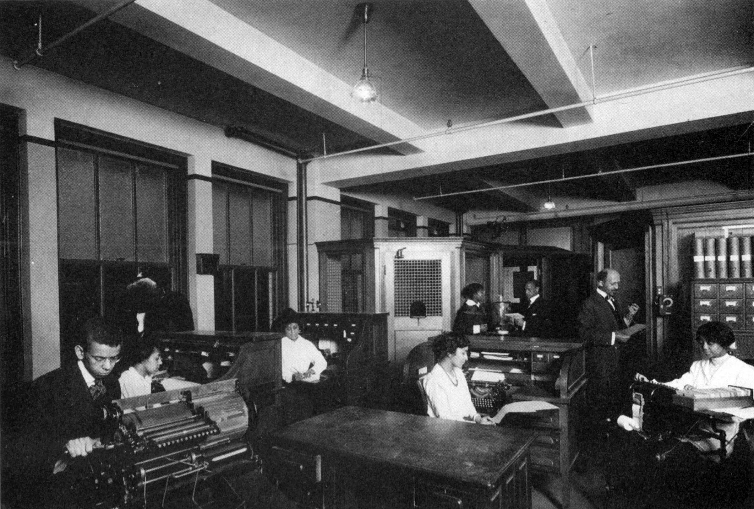 An undated photograph shows editor W. E. B. DuBois and his young staff in the New York City office of <em>The Crisis</em>, preparing an edition of the NAACP’s publication.