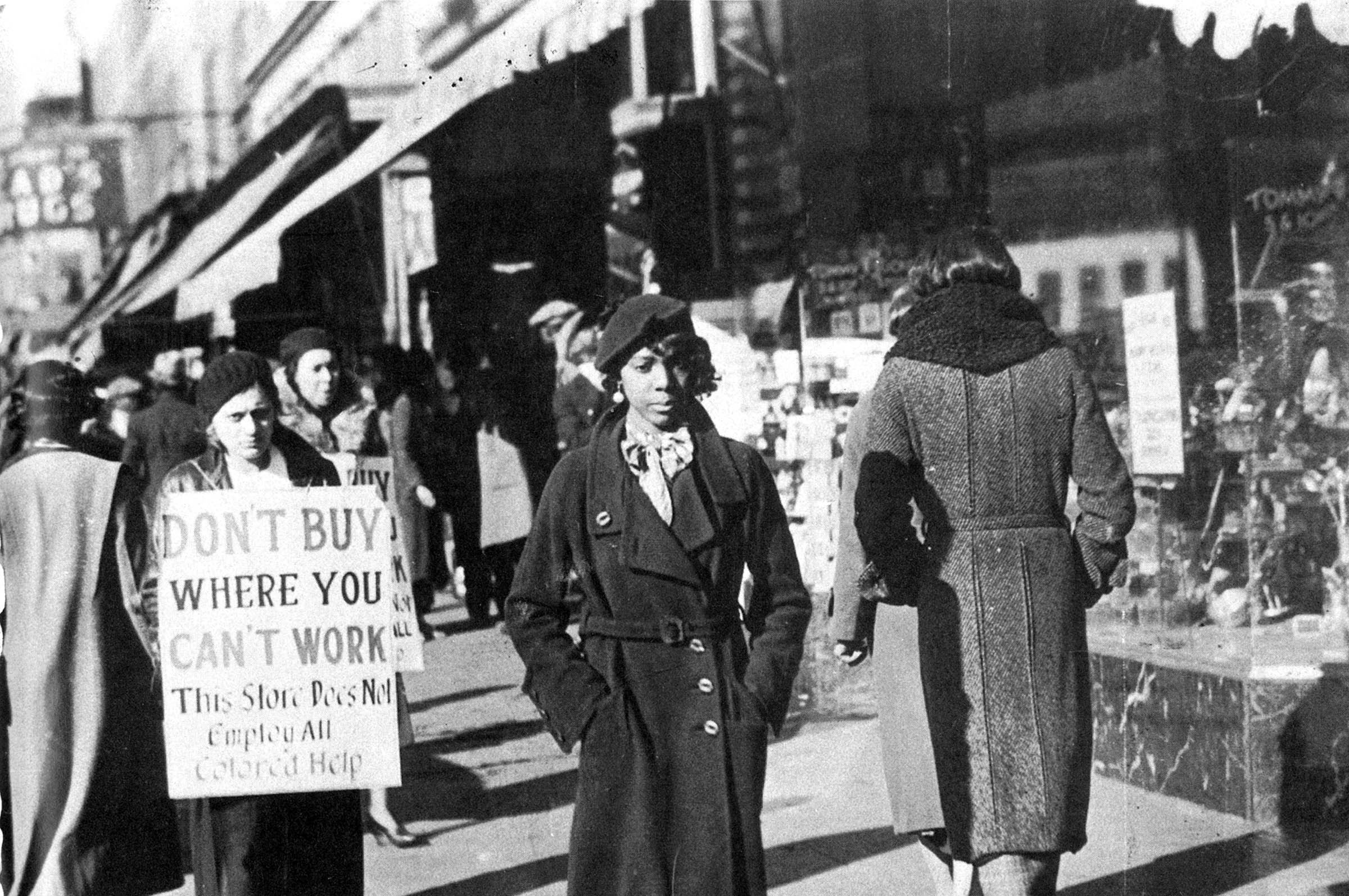 The women walking this picket line were asking customers to boycott one of the many white-owned stores that refused to hire Black employees in West Baltimore, Maryland. Similar demonstrations appeared in New York, Chicago, and other large cities in the early 1930s.