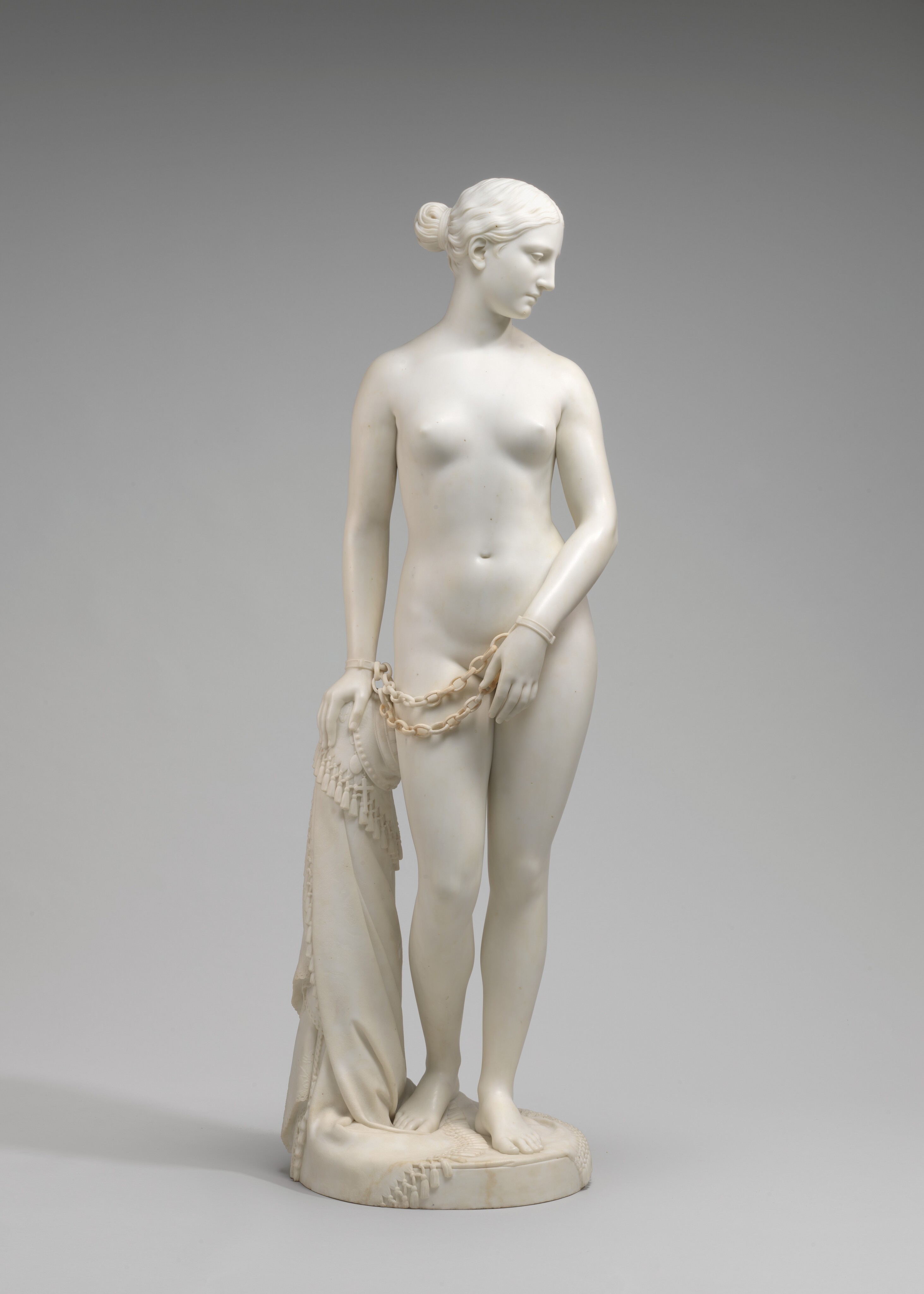 Created&nbsp;in 1844, American sculptor Hiram Powers’s statue of a nude enslaved white woman&nbsp;during the Greek war for independence from Turkey (1821-29) was one of&nbsp;the most&nbsp;popular works of art before the Civil War. In reduced scale it was widely&nbsp;reproduced and became a familiar decorative item in the parlors of American&nbsp;middle-class&nbsp;homes. Amid praise for its beauty and the compassion it generated,&nbsp;many observers interpreted the work as a comment on slavery in America.